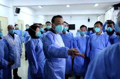 In Mask and Plastic Scrubs, Chinese Premier Visits Coronavirus Ground Zero Wuhan