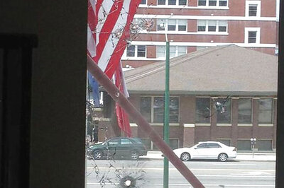 Sniper shoots suspect in Dallas police HQ attack