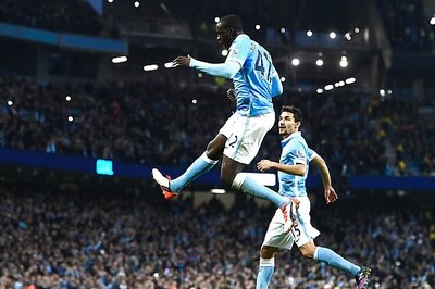 Yaya Toure's late penalty gives Manchester City 2-1 win against Norwich