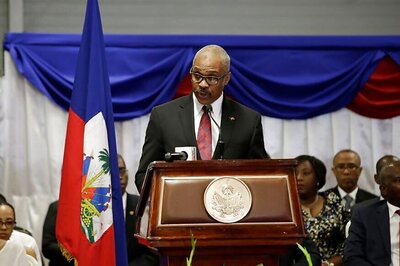 Haiti PM's Motorcade Hits 2, Killing 1, Near Flooded Zone