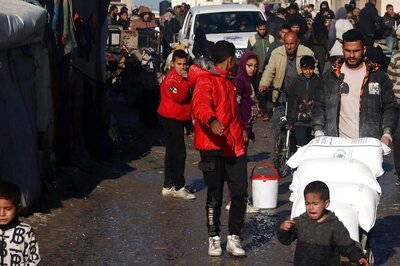 Strike on Palestinians Waiting for Aid in Gaza Kills and Wounds Dozens