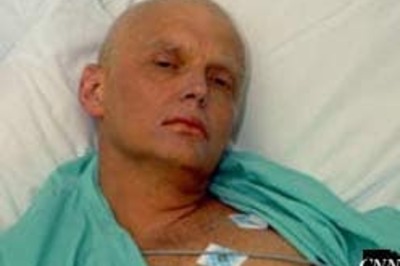 Russian spy buried, probe continues