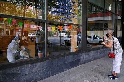 Spanish Nursing Home Residents Greet Friends, Family From Behind Windows