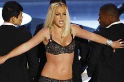 Entwrap: Catch Britney in circus, Jacko gets sued
